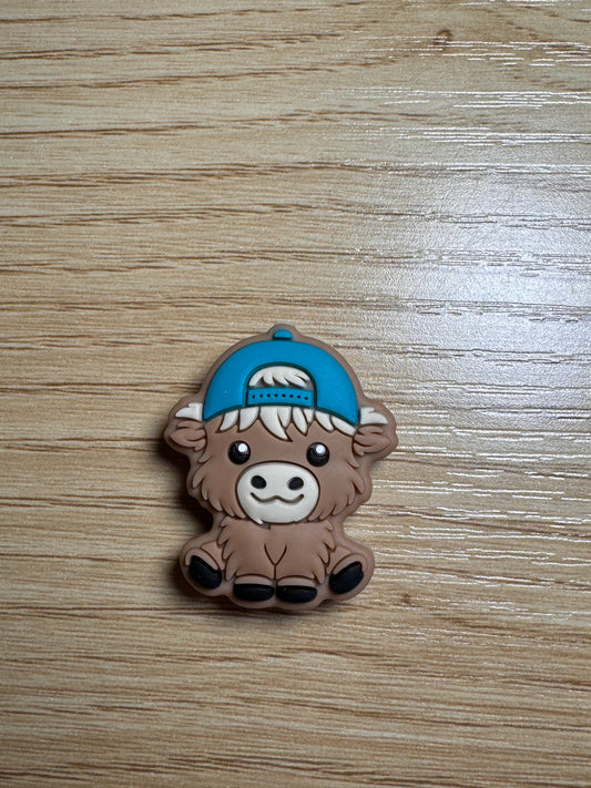 James the Cow with Teal Hat Silicone Focal